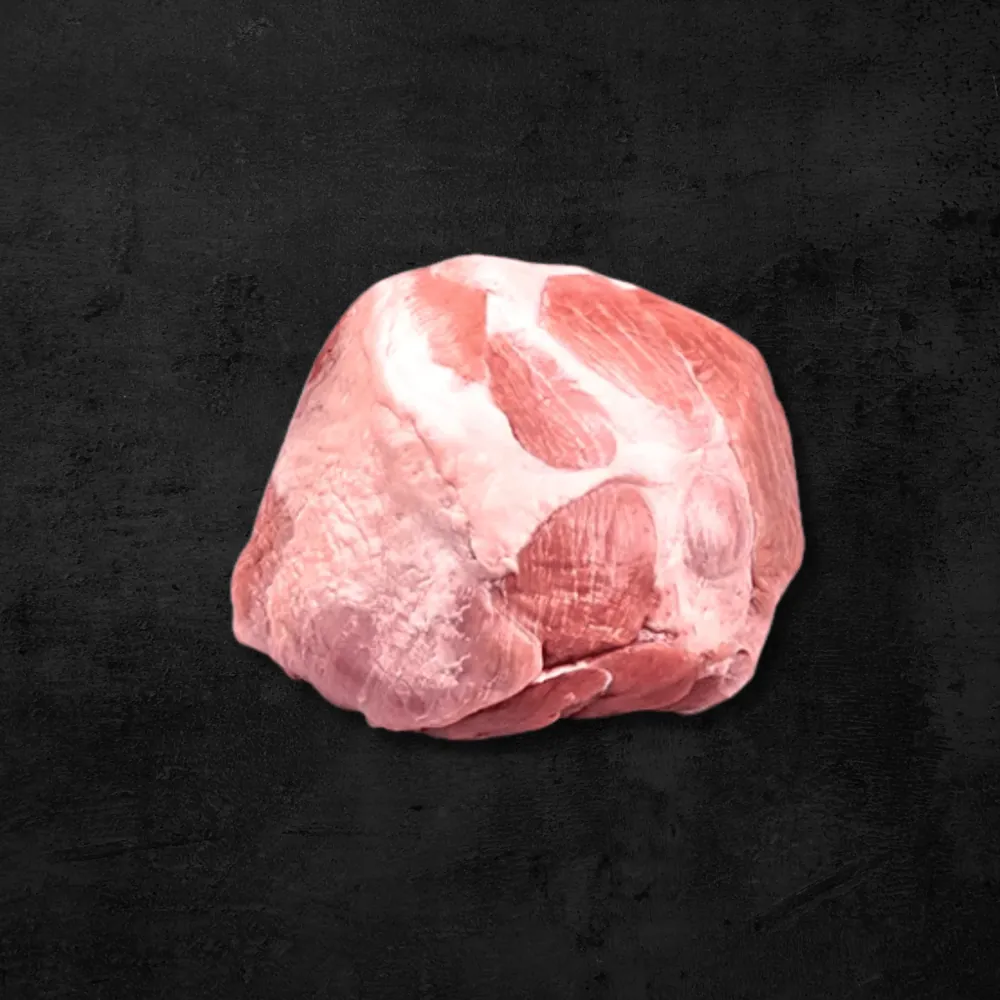 Manero brazuelo semimagro de cerdo sobre fondo oscuro